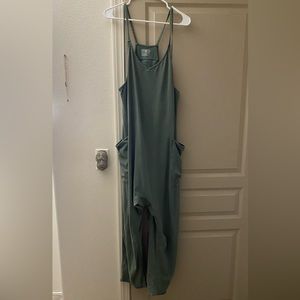 “LUSH PINE” FREE PEOPLE MOVEMENT HOT SHOT ONESIE LARGE